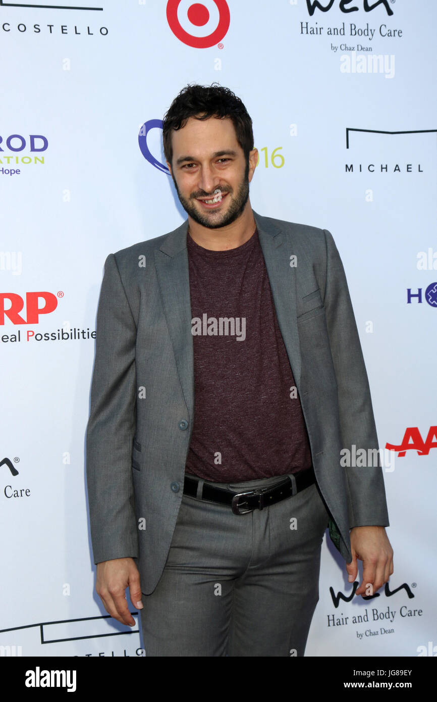 Pacific Palisades, CA, USA. 17th July, 2016. LOS ANGELES - JUL 16: Aaron Wolf at the HollyRod Presents 18th Annual DesignCare at the Sugar Ray Leonard's Estate on July 16, 2016 in Pacific Palisades, CA Credit: Kay Blake/ZUMA Wire/Alamy Live News Stock Photo