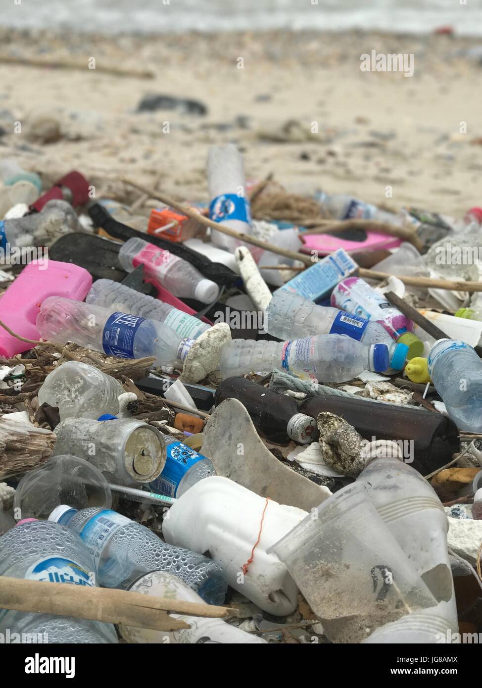 Plastic trash lying on a beach in Ko Sih Chang, an island in the Gulf of Thailand, 06 June 2017. The G20 summit in Hamburg will also deal with the problem of plastic trash in the world's oceans. For many this is only a theoretical problem but in Thailand's beaches it is possible to see how big the problem has already become. Photo: Christoph Sator/dpa Stock Photo