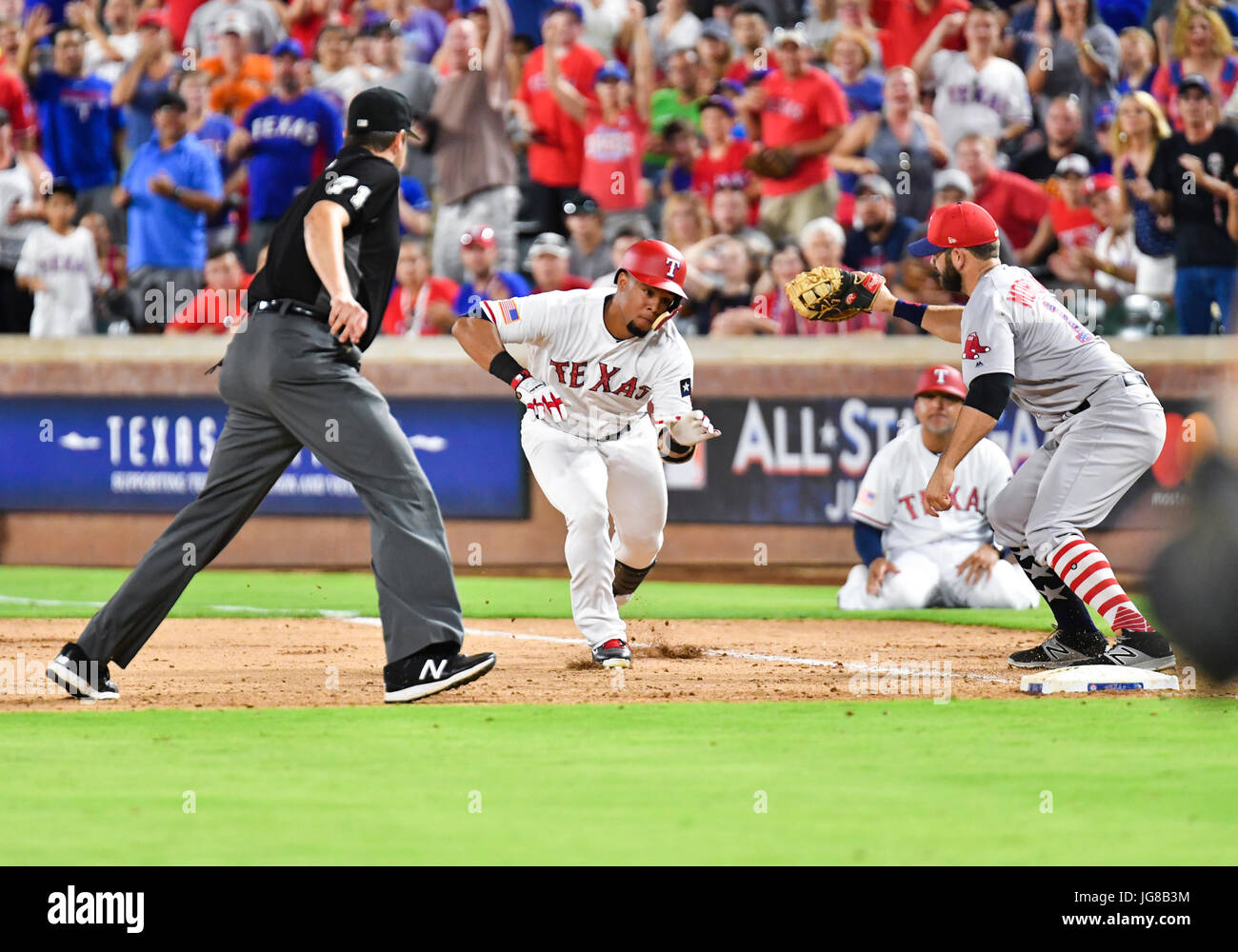 Arlington, Texas, USA. 3rd July, 2017. Texas Rangers center fielder Carlos Gomez #14 is tagged out after reaching first base safely in the ninth inning during an MLB game between the Boston Red Sox and the Texas Rangers at Globe Life Park in Arlington, TX Boston defeated Texas 7-5 Albert Pena/CSM Credit: Cal Sport Media/Alamy Live News Stock Photo