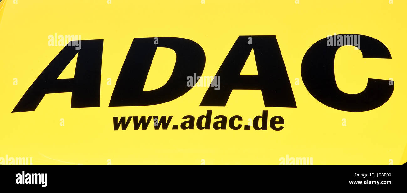 The logo of the General German Automotive Association ('Allgemeiner Deutscher Automobil-Club', ADAC) with the web adress can be seen during a campaign for the start of the holidays at the motorway A2 near Lehrte, Germany, 21 June 2017. Photo: Holger Hollemann/dpa Stock Photo