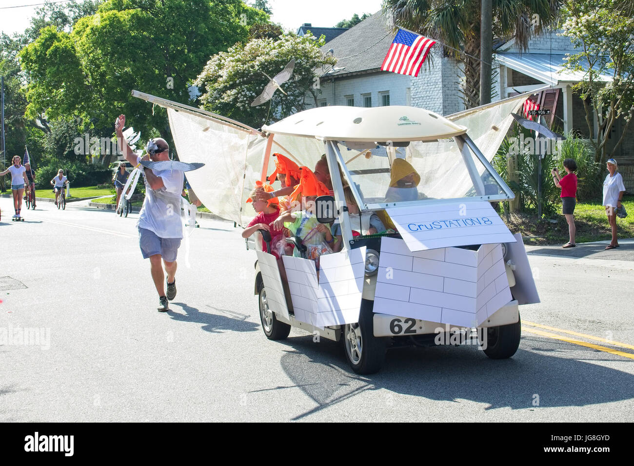 Sullivan's Island, South Carolina, USA. 4th July, 2017. A golf cart decorated as a shrimp boat during the annual Sullivan's Island Independence Day parade July 4, 2017 in Sullivan's Island, South Carolina. The tiny affluent sea island hosts a bicycle and golf cart parade through the historic village. Credit: Planetpix/Alamy Live News Stock Photo