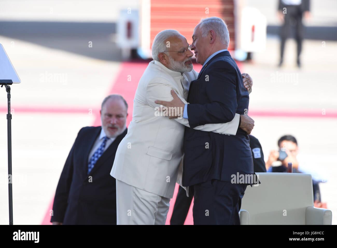Tel Aviv, Israel. 4th July, 2017. Israeli Prime Minister Benjamin Netanyahu (R) welcomes Indian Prime Minister Narendra Modi at Ben Gurion International Airport outside Tel Aviv, Israel, on July 4, 2017. Indian Prime Minister Narendra Modi landed in Israel Tuesday for the first-ever visit of an Indian prime minister to the country, in bid to boost all-round ties. Credit: JINI/Xinhua/Alamy Live News Stock Photo