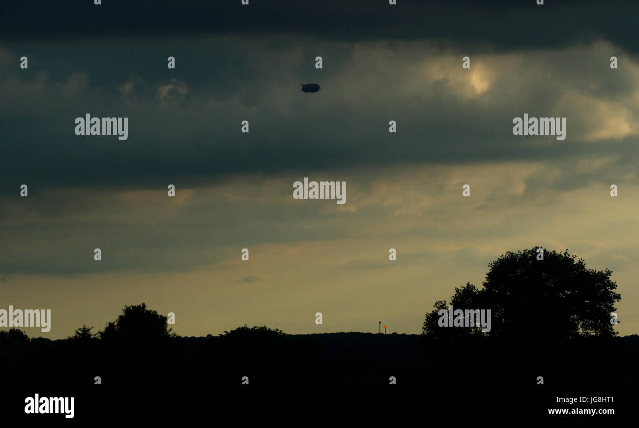 Bedford, UK. 4th July, 2017. The Airlander Air Ship is a mere dot in the distance as it hangs above the skies of Bedfordshire countryside near Bedford. Airlander Air Ship, Bedford, July 4, 2017 Credit: Paul Marriott/Alamy Live News Stock Photo