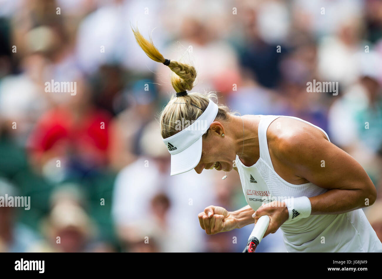 London, Britain. 4th July, 2017. Angelique Kerber of Germany celebrates after scoring during the women's singles first round match against Irina Falconi of the United States at the Championship Wimbledon 2017 in London, Britain, on July 4, 2017. Kerber won 2-0. Credit: Jin Yu/Xinhua/Alamy Live News Stock Photo