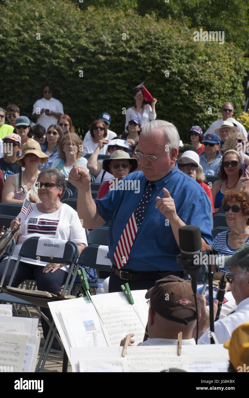 Cjicago, IL, USA. 4th July, 2017. The Chicago History Museum hosted its annual 4th of July Celebration with a concert and children's parade. The crowd enjoyed patriotic songs and a tribute to American service men and women. Uncle Sam (on stilts) was as popular as ever with people waiting in line to have their picture taken with him. Many in the crowd donned their red, white and blue outfits to honor the day Young and old alike enjoyed the celebration. Credit: Karen I. Hirsch/ZUMA Wire/Alamy Live News Stock Photo