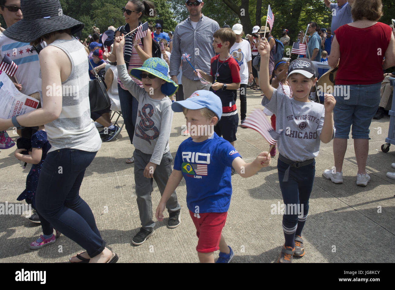 Chicago, IL, USA. 4th July, 2017. The Chicago History Museum hosted its annual 4th of July Celebration with a concert and children's parade. The crowd enjoyed patriotic songs and a tribute to American service men and women. Uncle Sam (on stilts) was as popular as ever with people waiting in line to have their picture taken with him. Many in the crowd donned their red, white and blue outfits to honor the day Young and old alike enjoyed the celebration. Credit: Karen I. Hirsch/ZUMA Wire/Alamy Live News Stock Photo