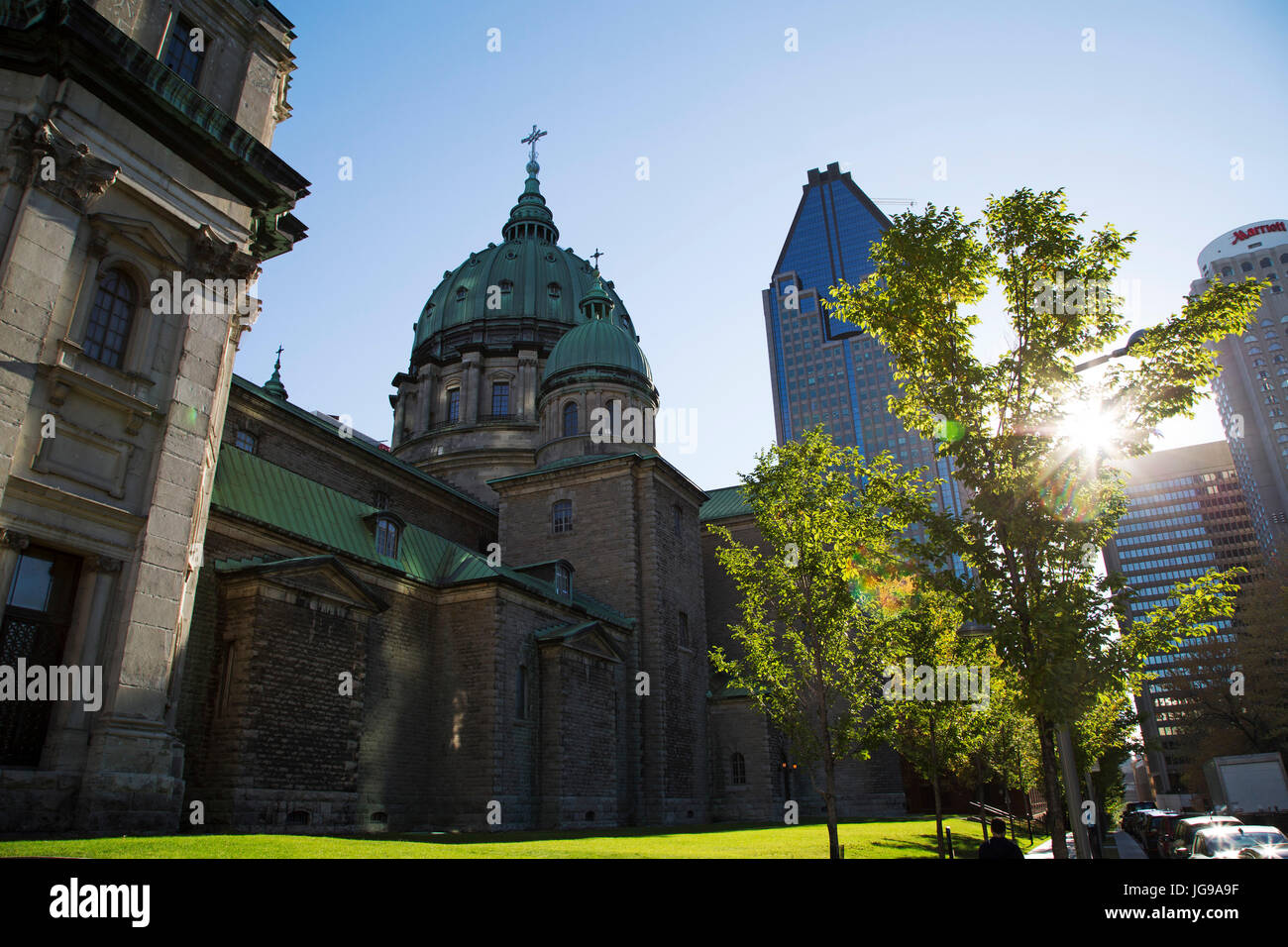 Sunshine and fall colours by the Mary Queen of the World Cathedral (Cathedrale Marie-Reine-du-Monde) in Montreal, Canada. Stock Photo