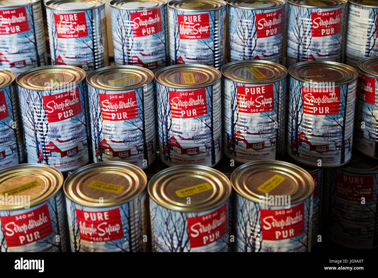 Canned maple syrup on sale at the Jean-Talon Market in the Little Italy district of Montreal, Canada. Stock Photo