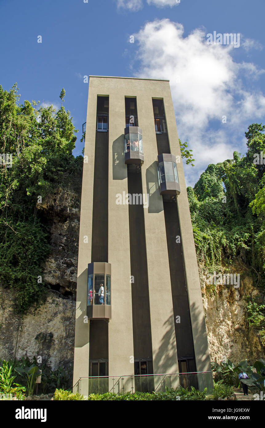 Outdoor elevators for reaching Harrison's Cave tour in Barbados uplands. Stock Photo