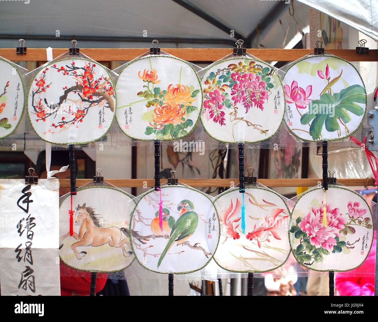 A New Year's outdoor market sells traditional Chinese hand-painted fans Stock Photo
