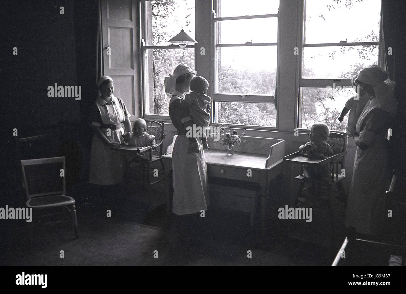 940, England, wartime, newly evacuateed infant children in prams   being cared for at Stanstead Hall, Essex, home of Lady Butler (Sydney Courtauld) wife of Conservative politican Rab Butler. Stock Photo