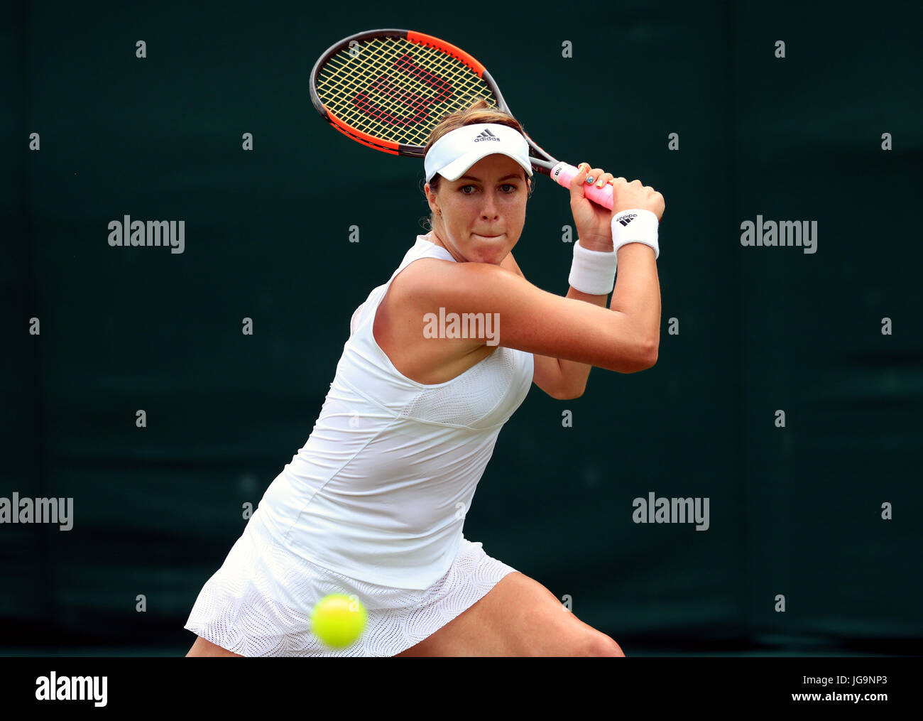 Anastasia Pavlyuchenkova in action against Arina Rodionova on day two of the Wimbledon Championships at The All England Lawn Tennis and Croquet Club, Wimbledon. Stock Photo