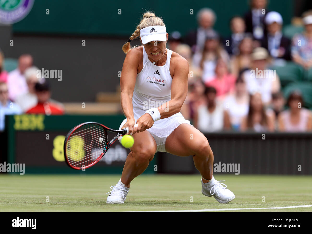 Angelique Kerber in action against Irina Falconi on day two of the Wimbledon Championships at The All England Lawn Tennis and Croquet Club, Wimbledon. Stock Photo