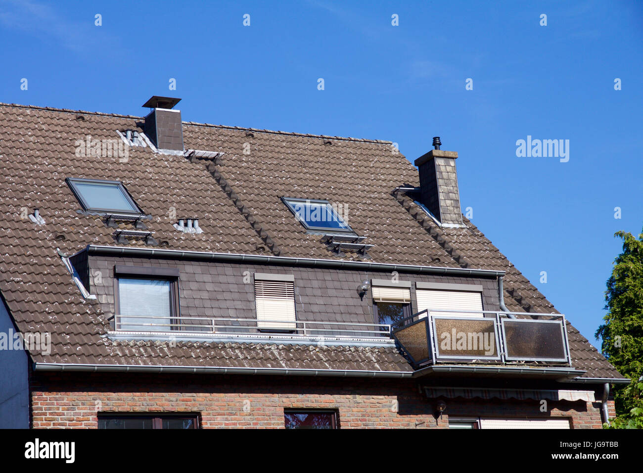Close Up View On A House With Balcony And Dormer Windows Stock