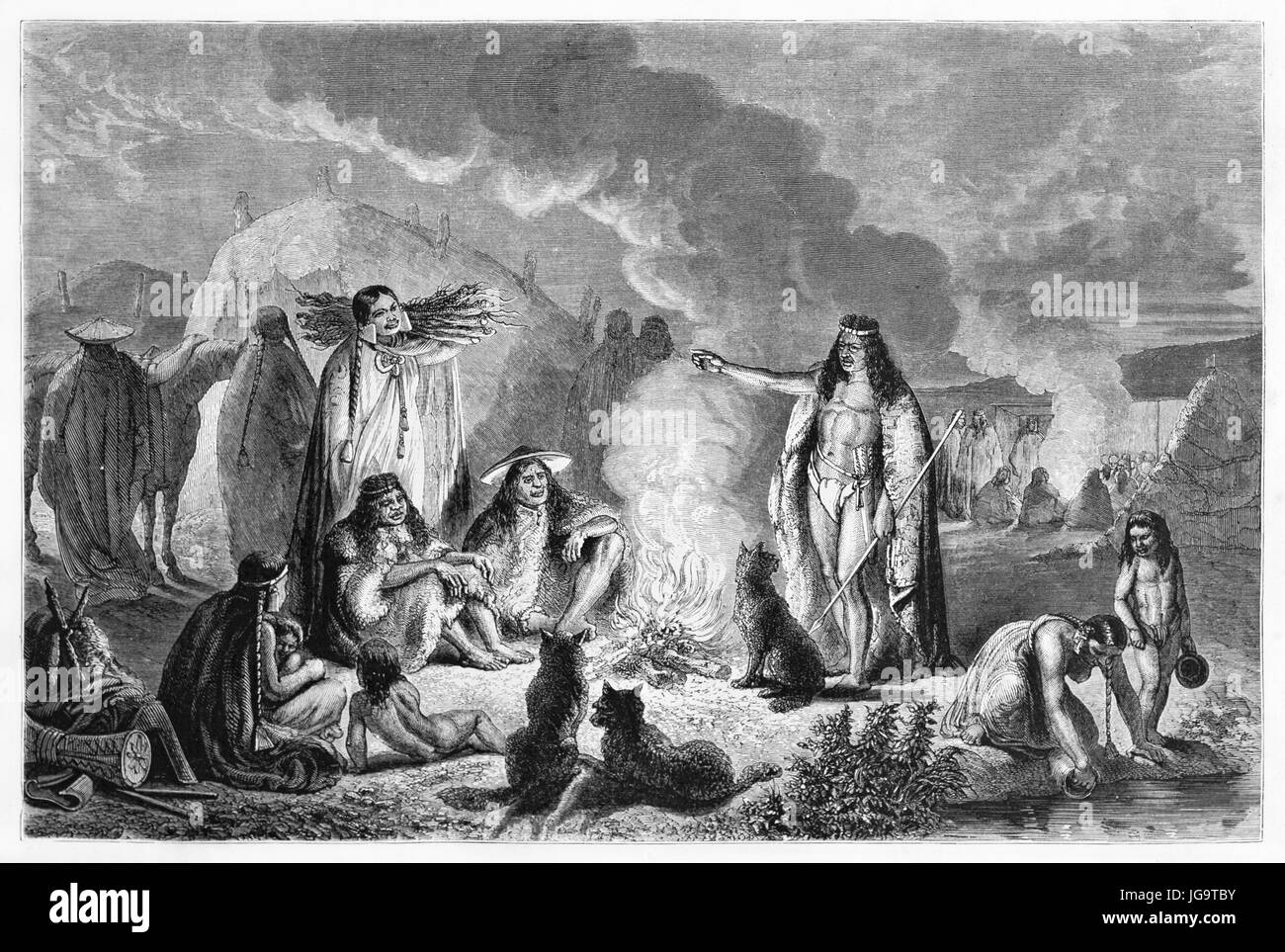 Teuelche people tribe around fire in their camp at evening, Patagonia. Ancient grey tone etching style art by Hadamard, published on 1861 Stock Photo