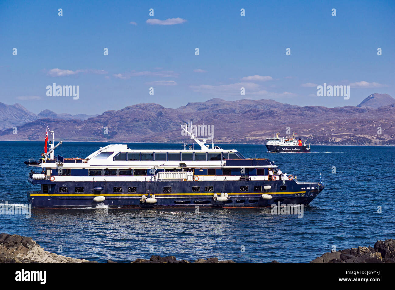 Cruise ship Lord of the Glens sailing in the Sound of Sleat outside Armadale pier at the Isle of Skye highland Scotland UK & Lord of the Isles behind Stock Photo