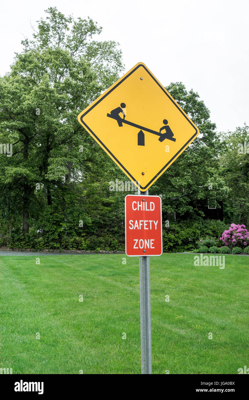 suburban street sign child safety zone type and seesaw icon Stock Photo