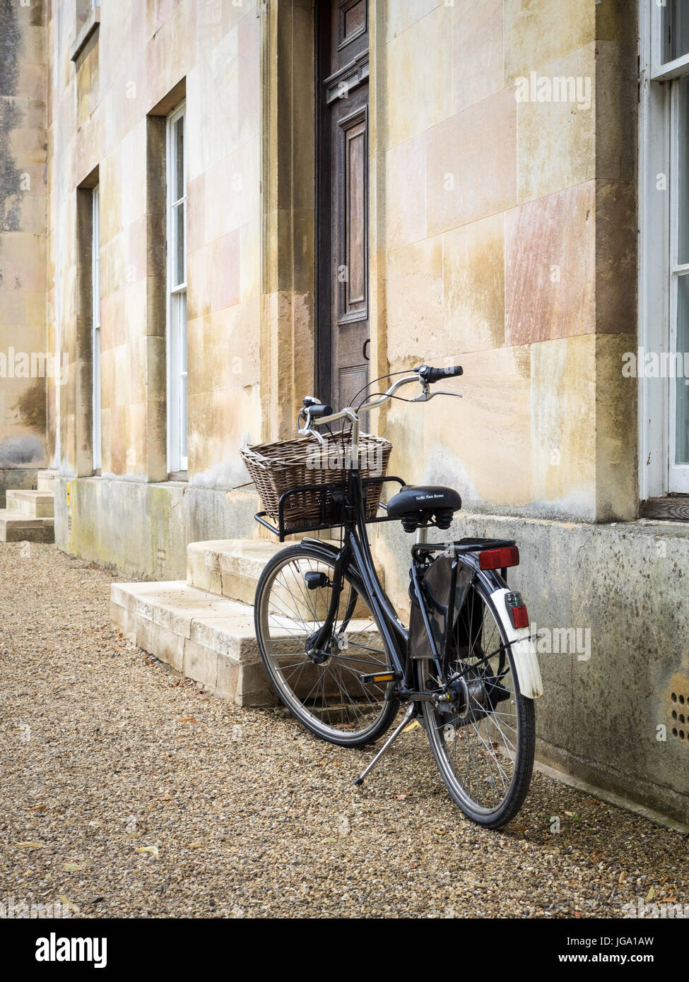 Student Bike outside college buildings at Downing College, part of the University of Cambridge, UK. Downing College was founded in 1800. Stock Photo