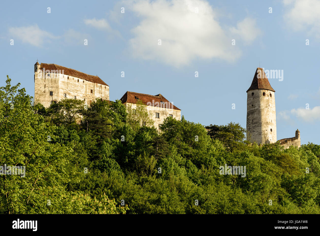 Outdoor scenic color photography of the medieval castle Seebenstein, Austria, located on a hill with a green forest taken on a sunny spring day Stock Photo
