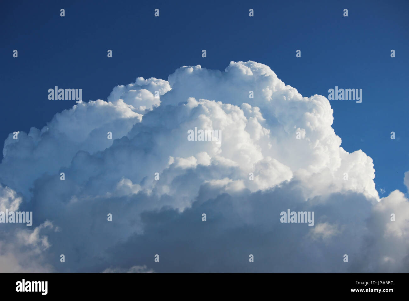white clouds against the blue sky on a sunny summer day Stock Photo - Alamy