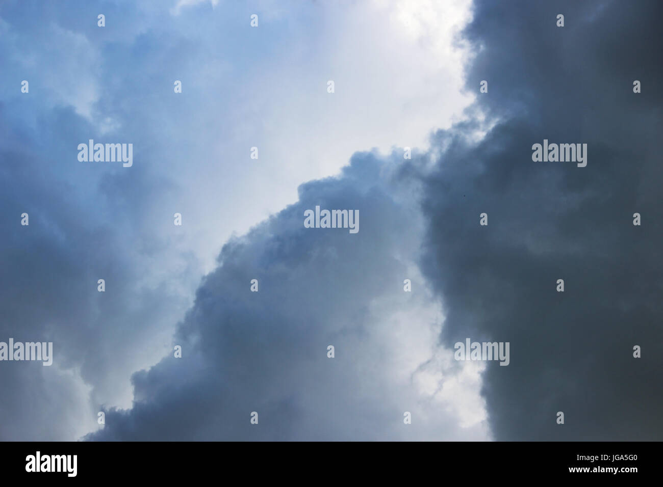 white clouds against the blue sky on a sunny summer day Stock Photo - Alamy