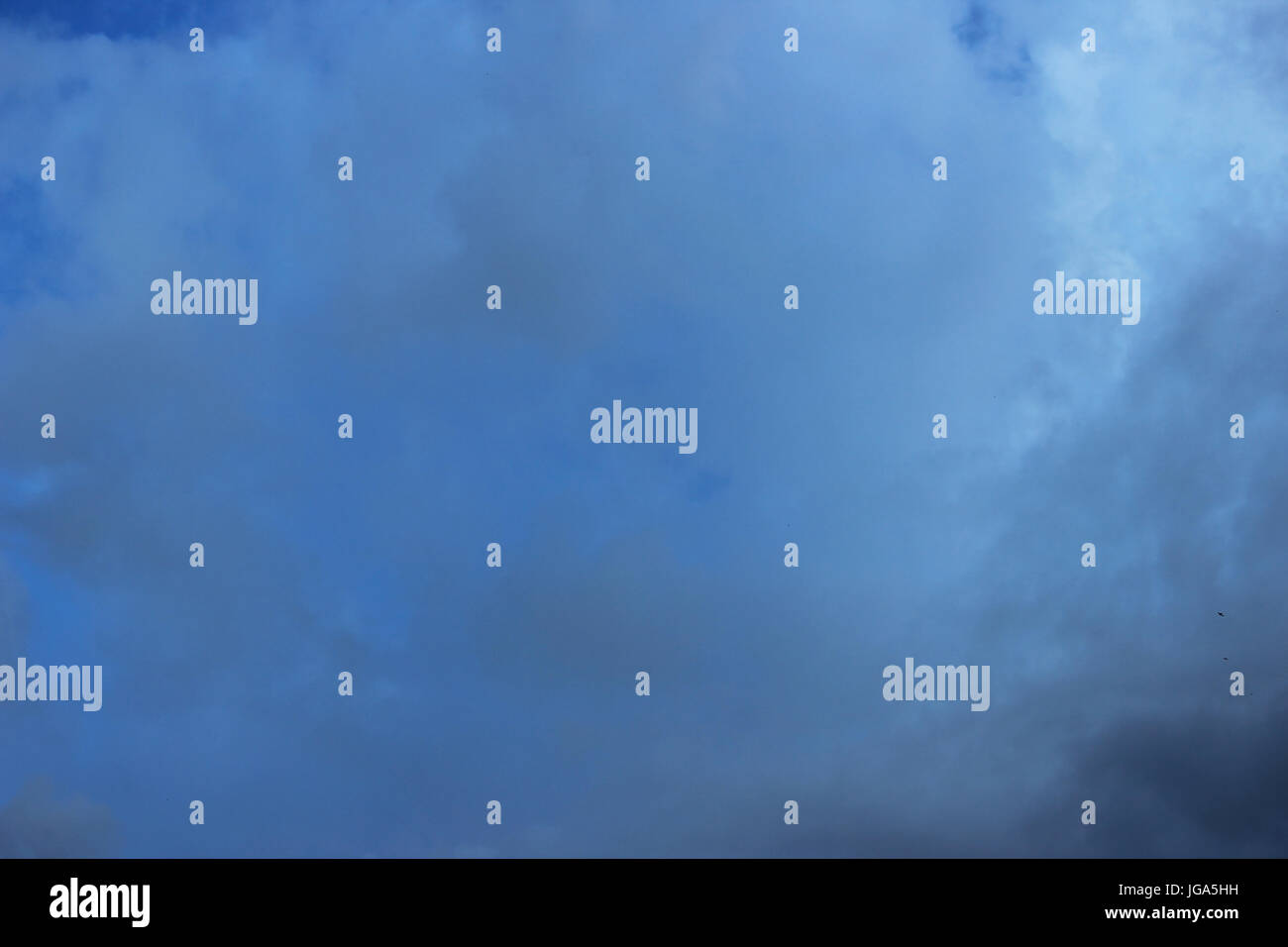 white clouds against the blue sky on a sunny summer day Stock Photo - Alamy