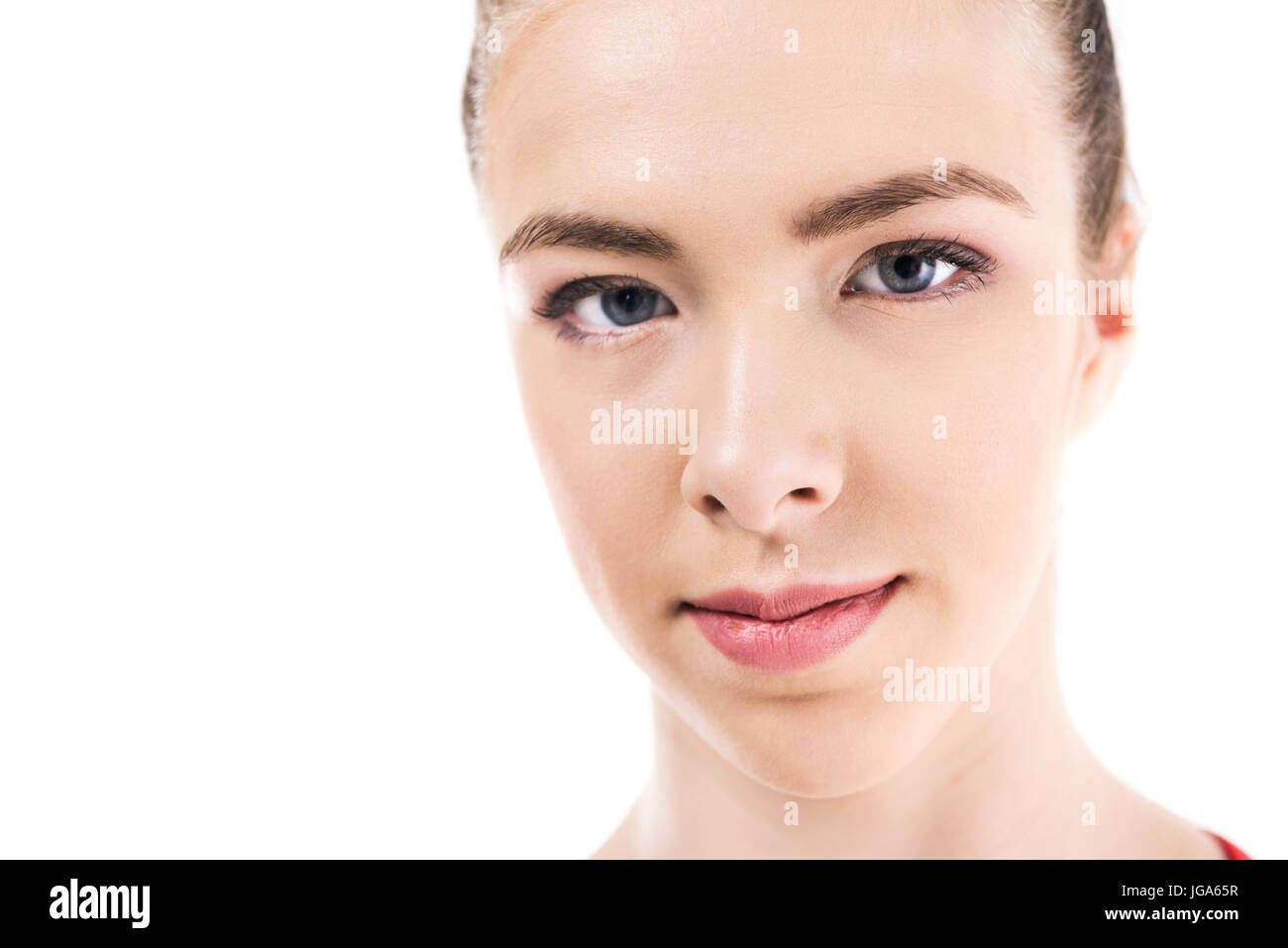 close up portrait of young caucasian woman looking at camera isolated on white Stock Photo