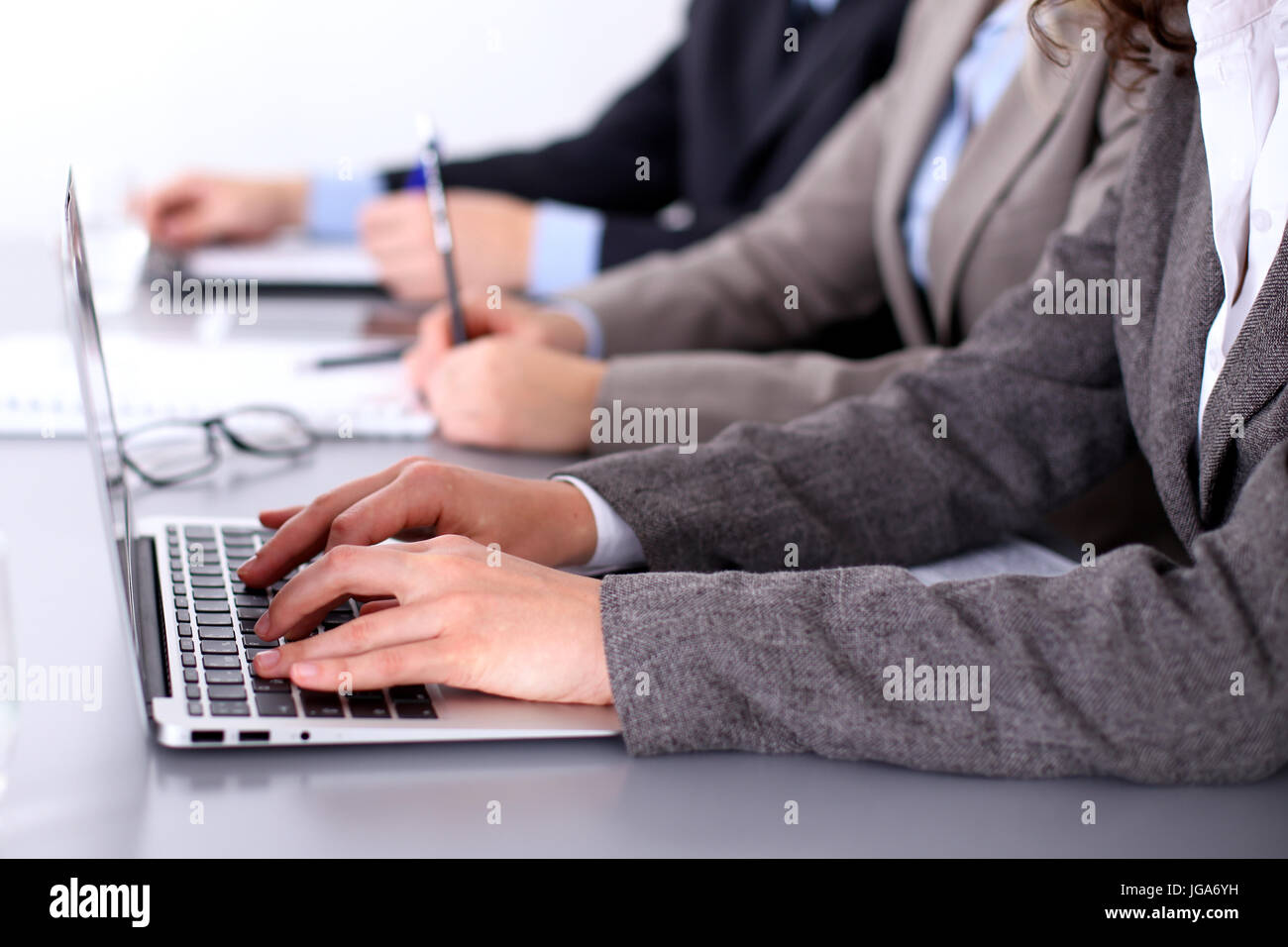 Group of business people working together in office Stock Photo - Alamy