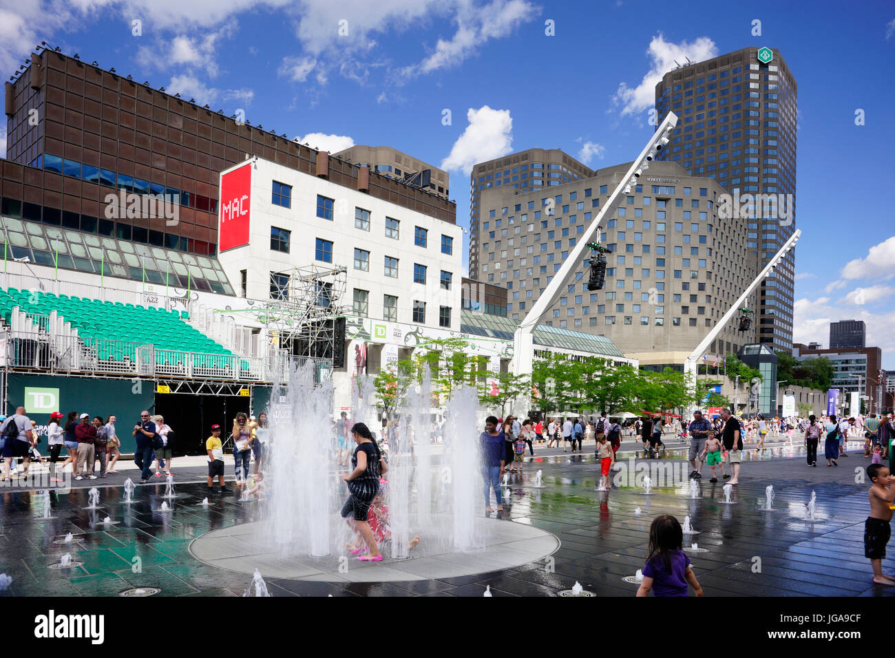 People out and about at the Place des Festivals during the Montreal International Jazz Festival. Stock Photo
