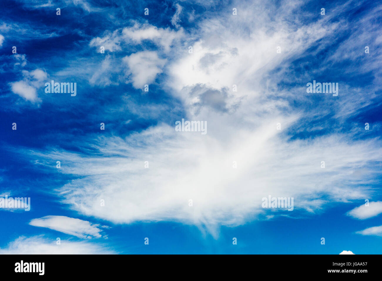 Fair weather high clouds against clear blue Colorado sky Stock Photo