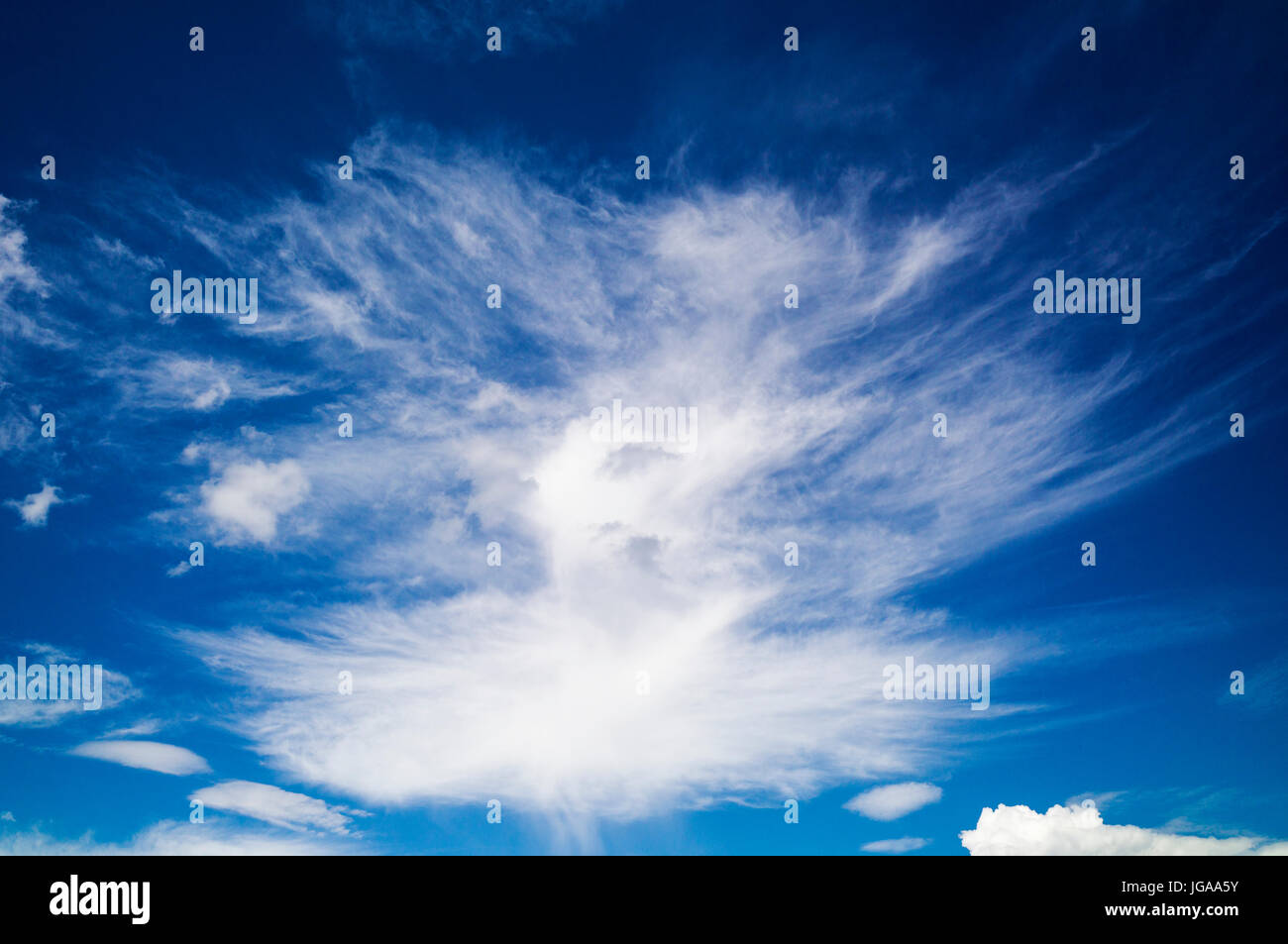 Fair weather high clouds against clear blue Colorado sky Stock Photo