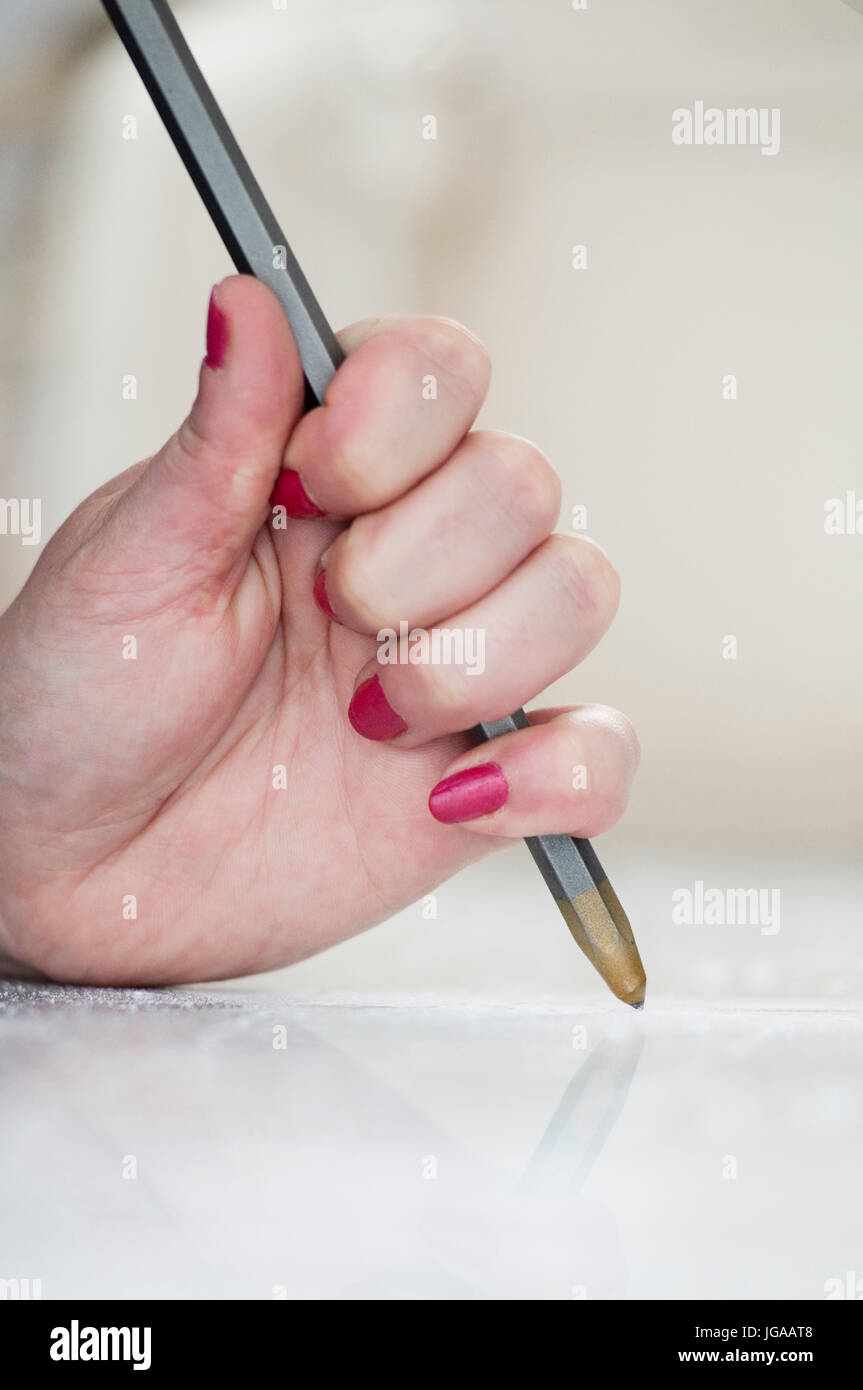 A Woman is Sculpting a Block of Marble Stock Photo Alamy