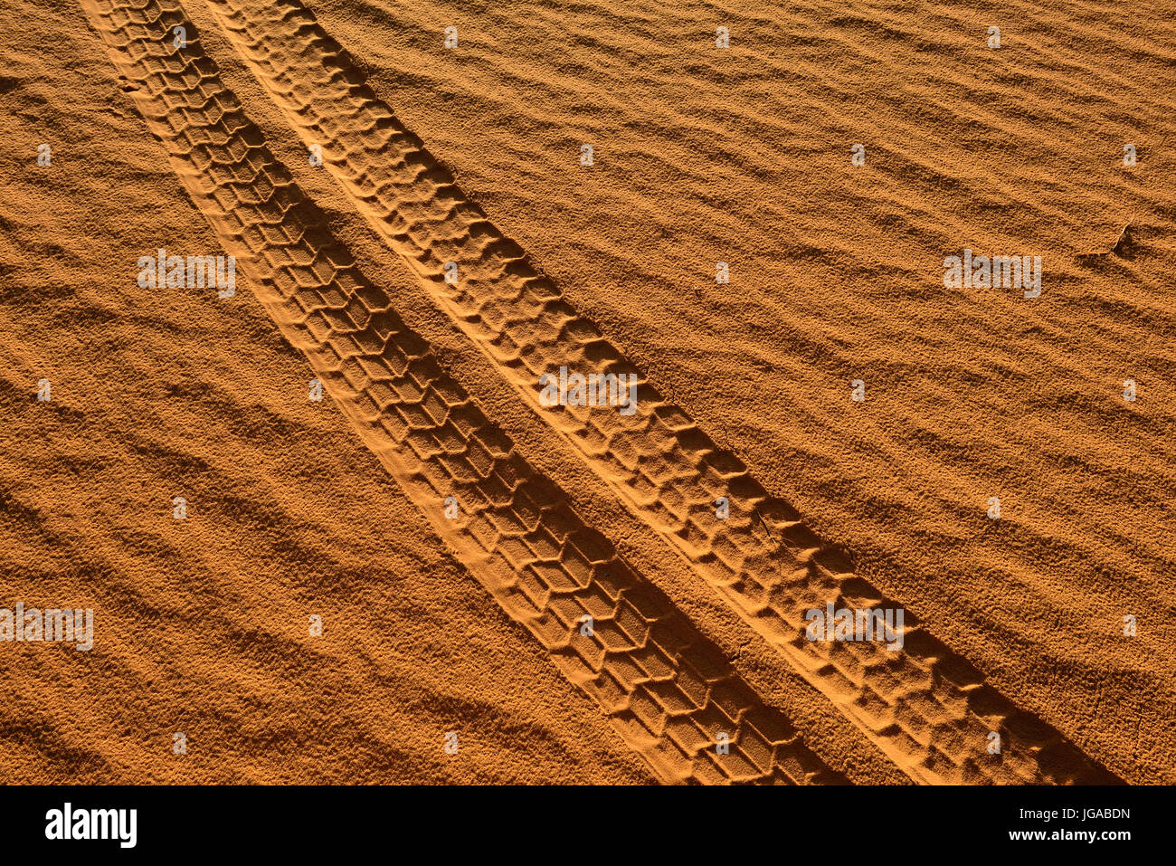 Vehicle tracks on a sand dune, Tassili n'Ajjer National Park, UNESCO World Heritage Site, Sahara desert, Algeria Stock Photo