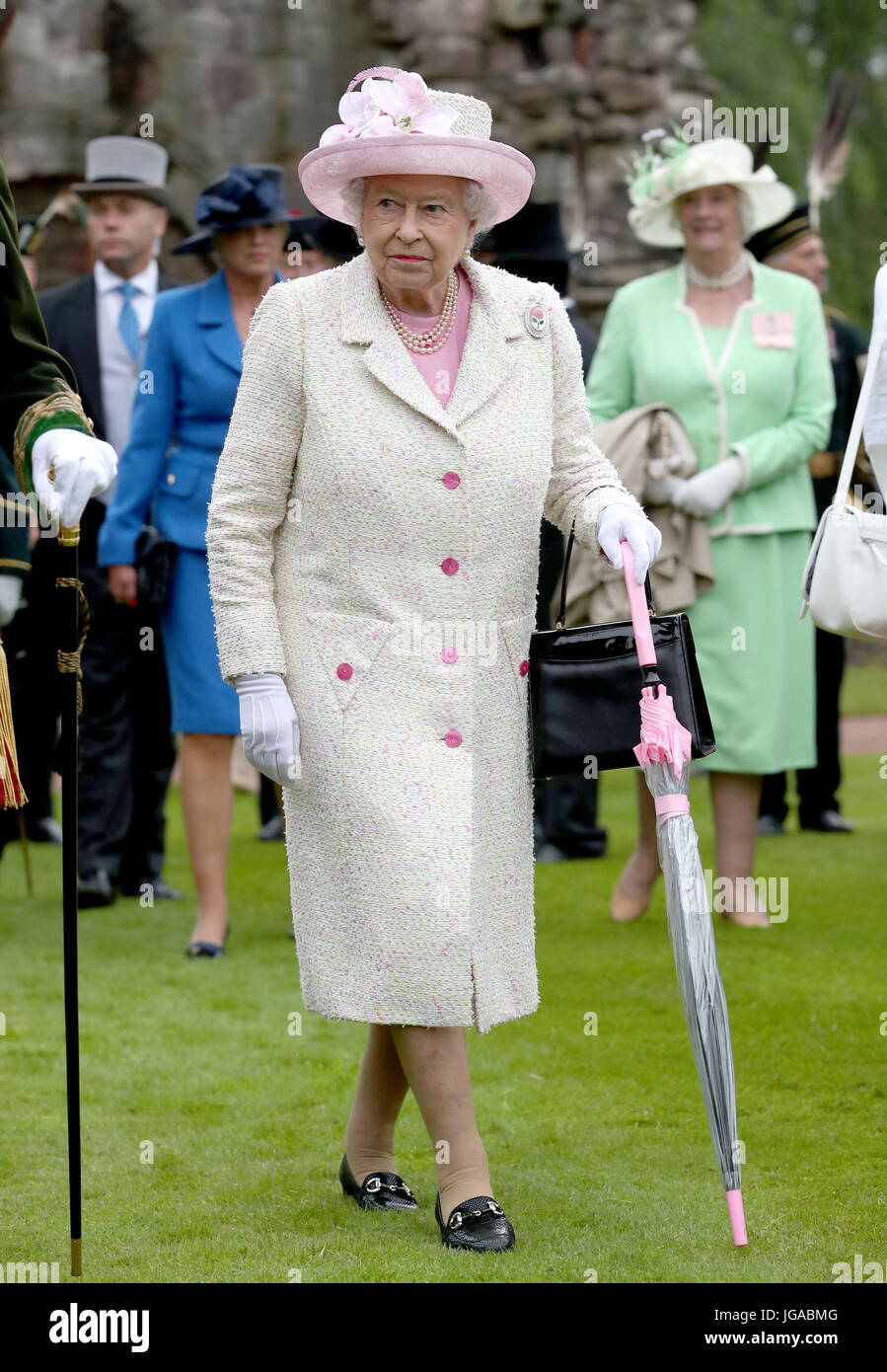 Queen Elizabeth II attends the annual garden party at the Palace of
