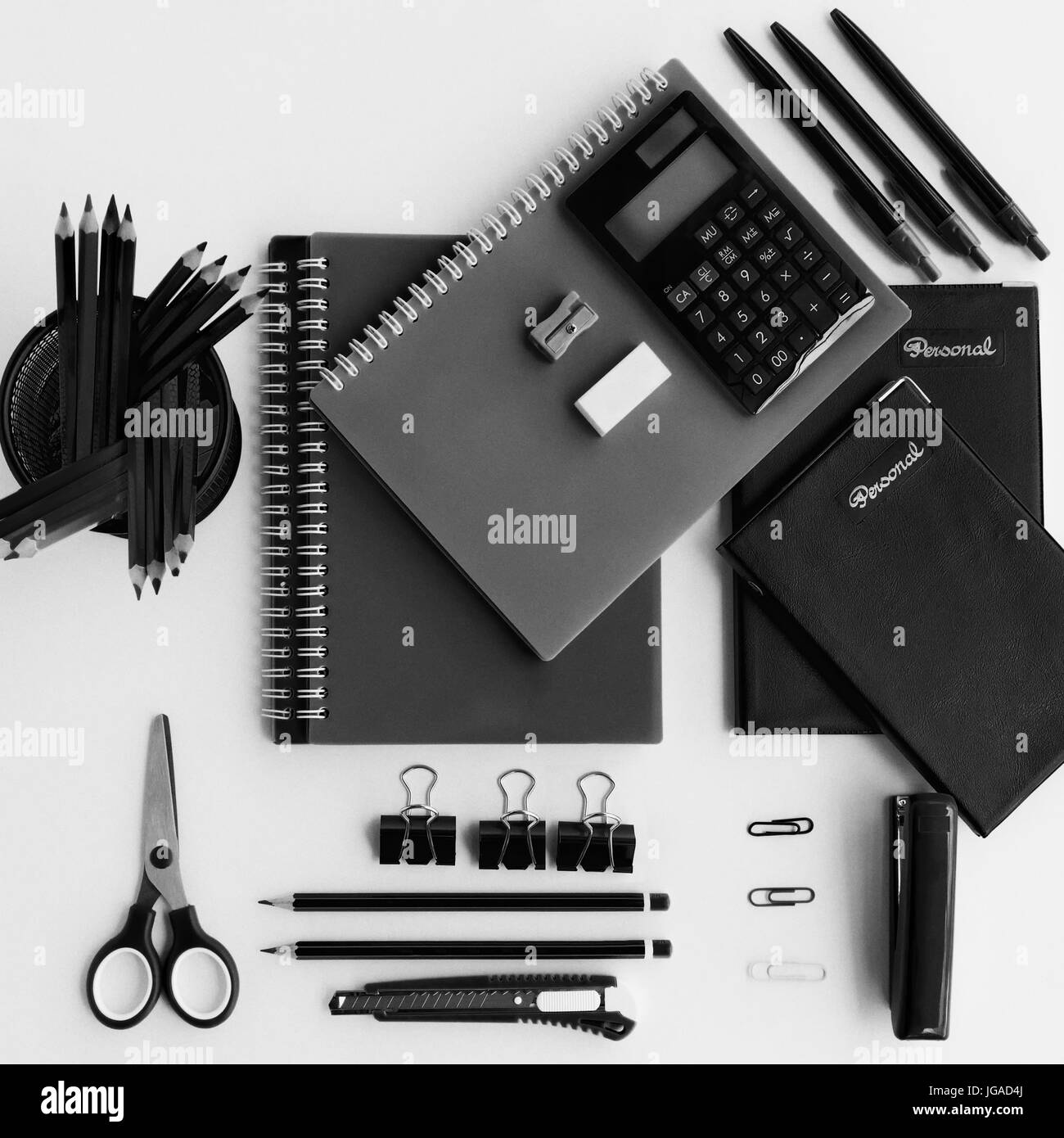 Top view of office supplies ans stationery in black and white Stock Photo