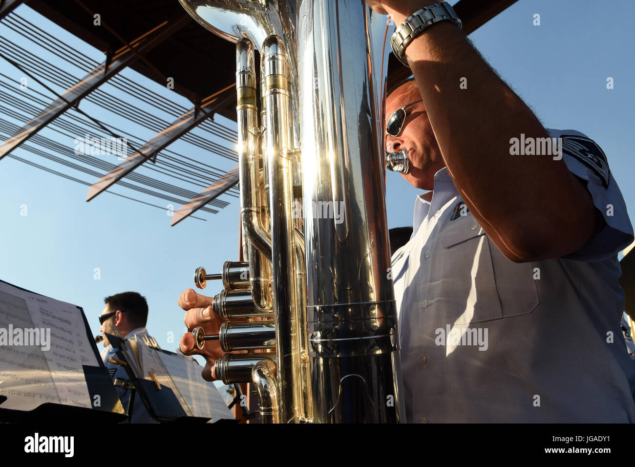 Master Sgt. Matt Wittman, Band of the Southwest instrumentalist, plays the tuba during an outdoor performance at Posse Ground Park June 29 in Sedona, AZ. The band performed at ten venues during its 14-day summer tour through Arizona and New Mexico. (Texas Air National Guard photo by Staff Sgt. Kristina Overton) Stock Photo