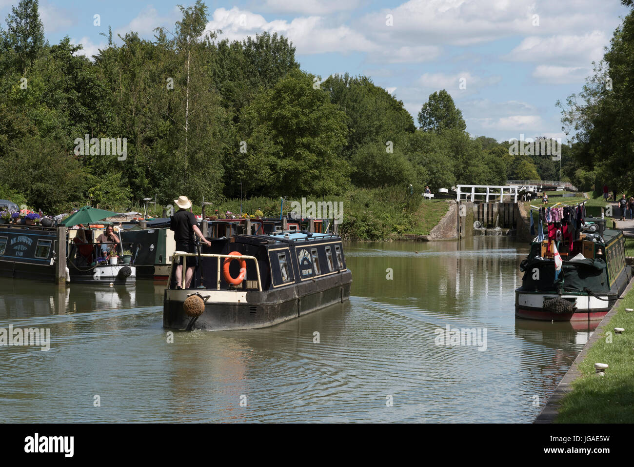 Holiday rental canalboat on the Kennet & Avon Canal close to Devizes in Wiltshire England UK. Stock Photo