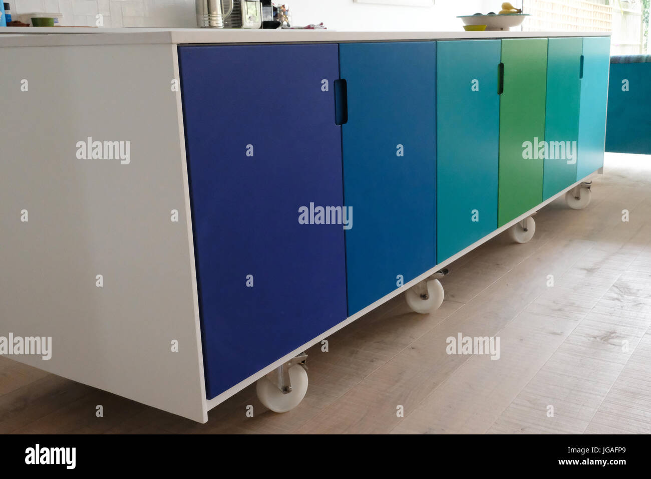 Movable kitchen island on castor wheels Stock Photo Alamy