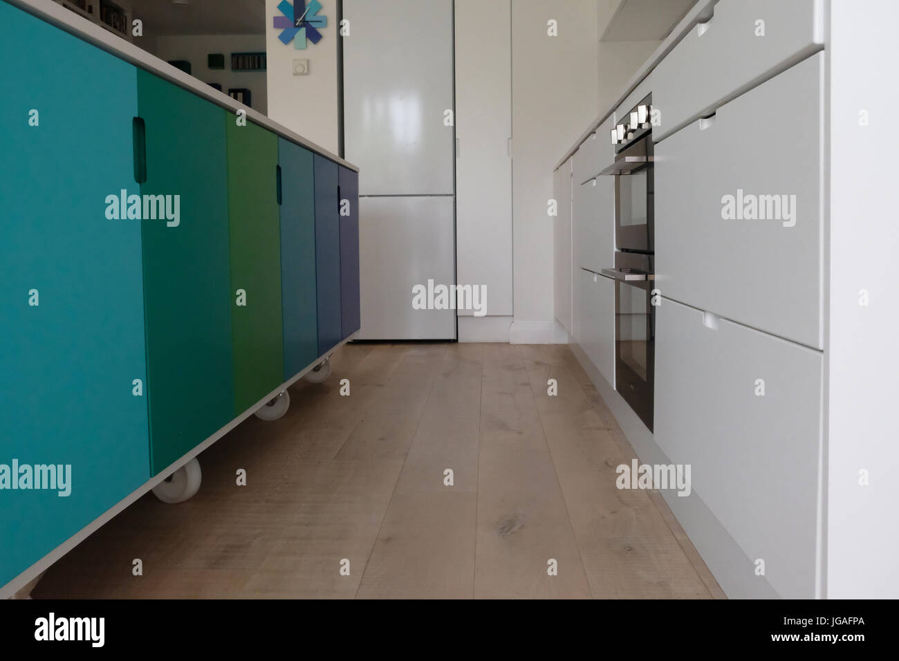 Movable kitchen island on castor wheels Stock Photo Alamy