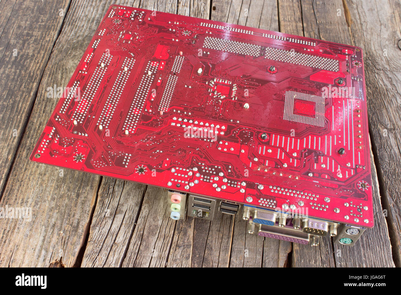 Hardware motherboard component on wooden background Stock Photo