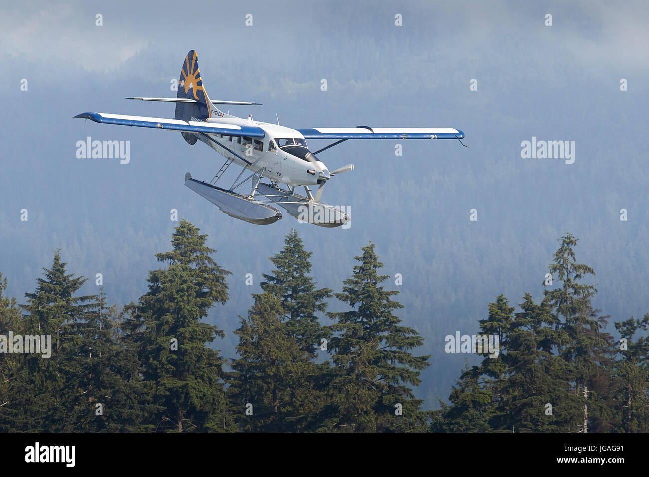 Harbour Air Turbo Otter Floatplane In The Whistler Air Insignia Approaching Vancouver Harbour, British Columbia, Canada. Stock Photo