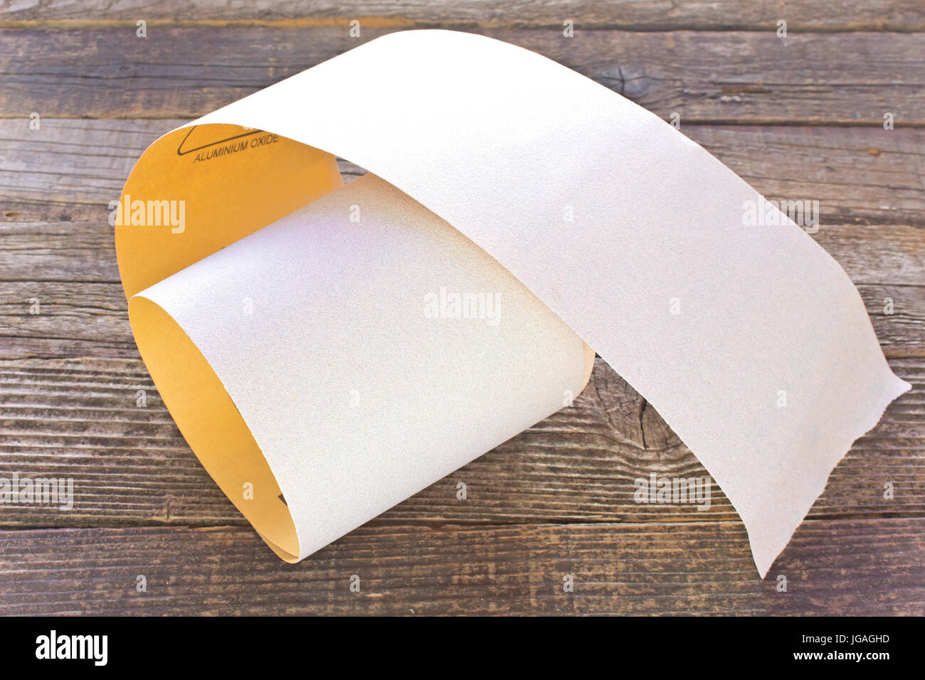 Emery paper - sandpaper on wooden board Stock Photo