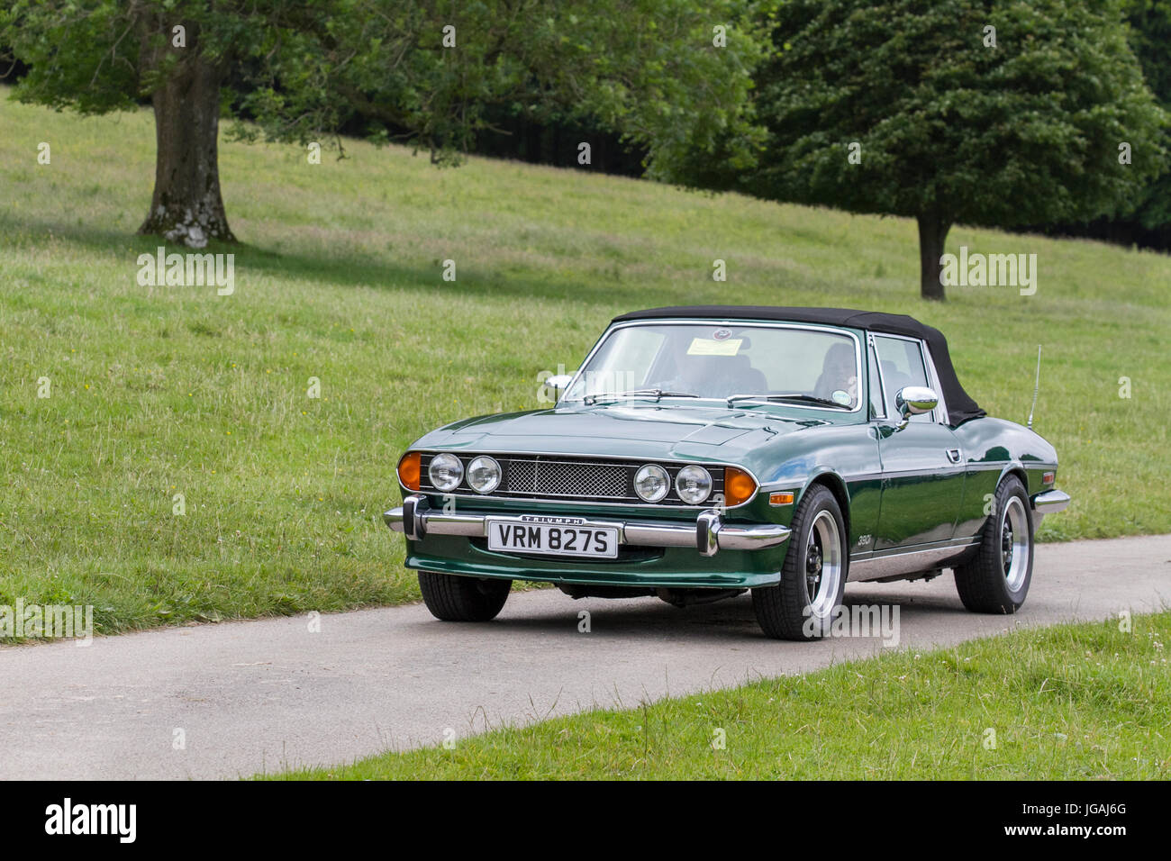 1978 70s isolated green 1978 Triumph Stag Classic, collectable restored vintage vehicles arriving for the Mark Woodward Event at Leighton Hall, Carnforth, UK Stock Photo