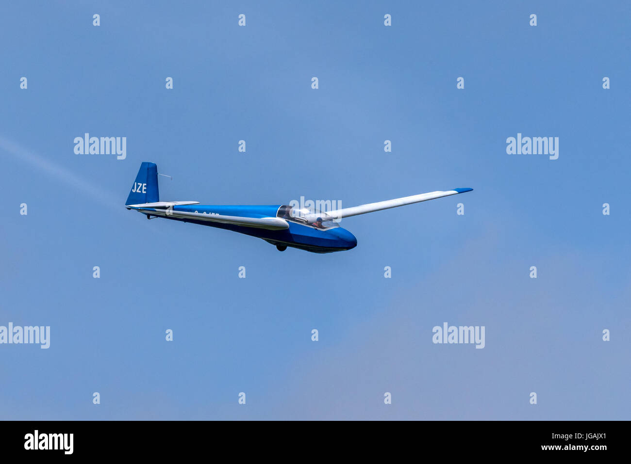 A glider soaring over Parlick in the Forest of Bowland Stock Photo