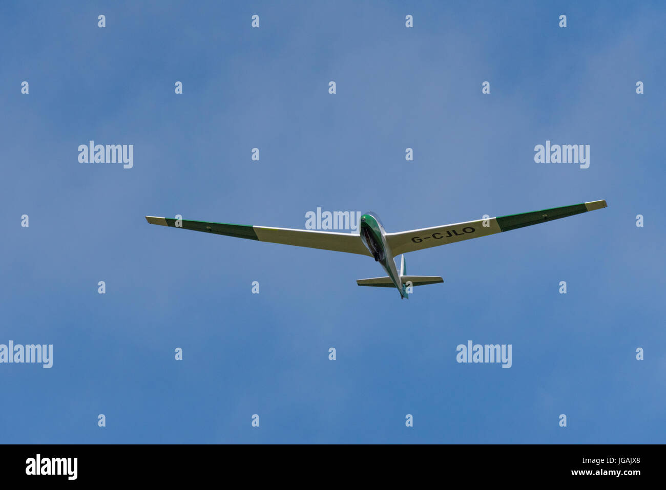 A glider soaring over Parlick in the Forest of Bowland Stock Photo