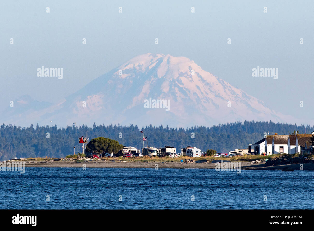 Mount Rainier, Mt Rainier, Mt. Rainier with Point Hudson, Port Townsend in foreground. Campers camping Point Hudson on Puget Sound. Stock Photo