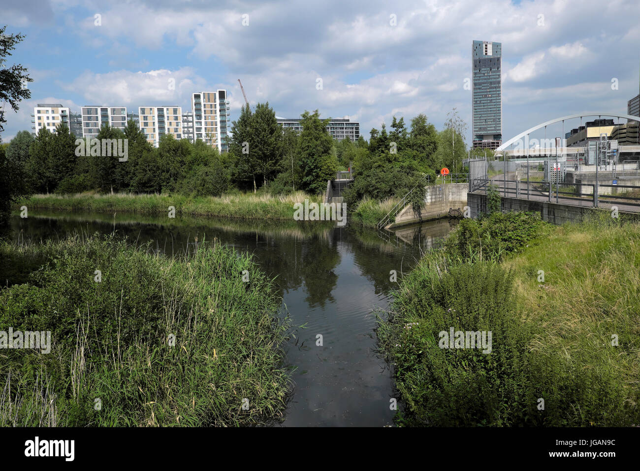 River Lea flowing through the Queen Elizabeth Olympic Park landscape in ...