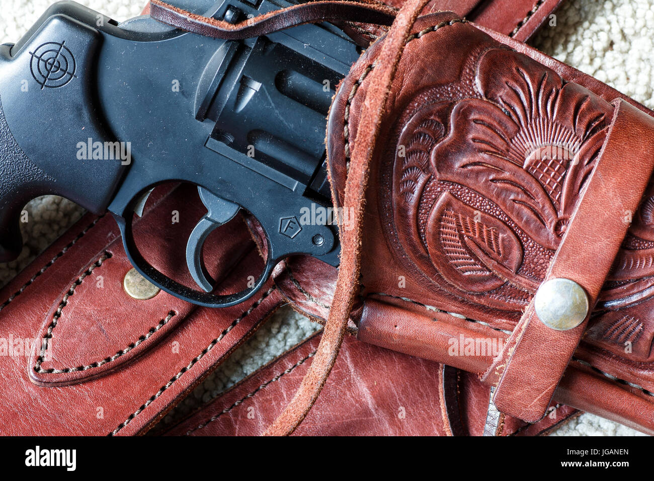 Close up of leather holster with toy bb gun pistol Stock Photo Alamy