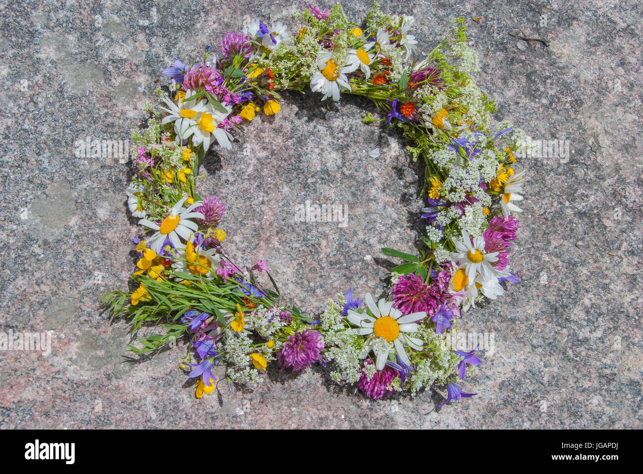 Wreath of wild flowers in Midsummer Stock Photo Alamy