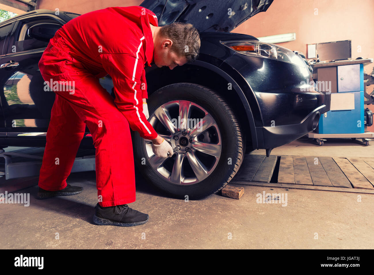 Auto Repair Nearby >> Young Concentrated Male Auto Mechanic Standing Near A Black Auto Repair Nearby >> Young Concentrated Male Auto Mechanic Standing Near A Black